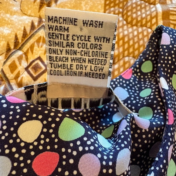 Notations Pastel Polka Dot Print
Sleeveless Top - Picture 6 of 9